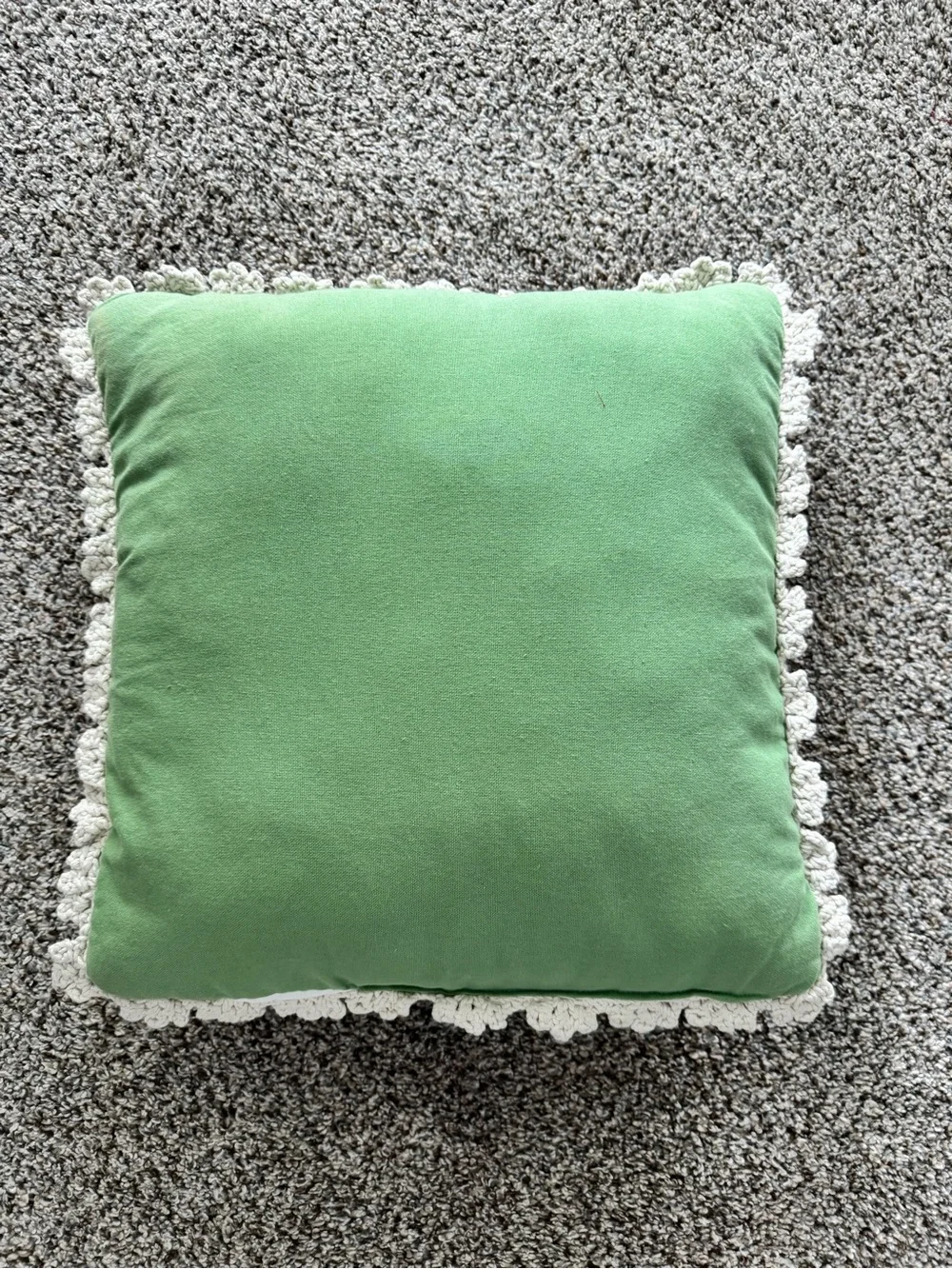 Cream Crochet Throw Pillow with Green Peace Sign Accent